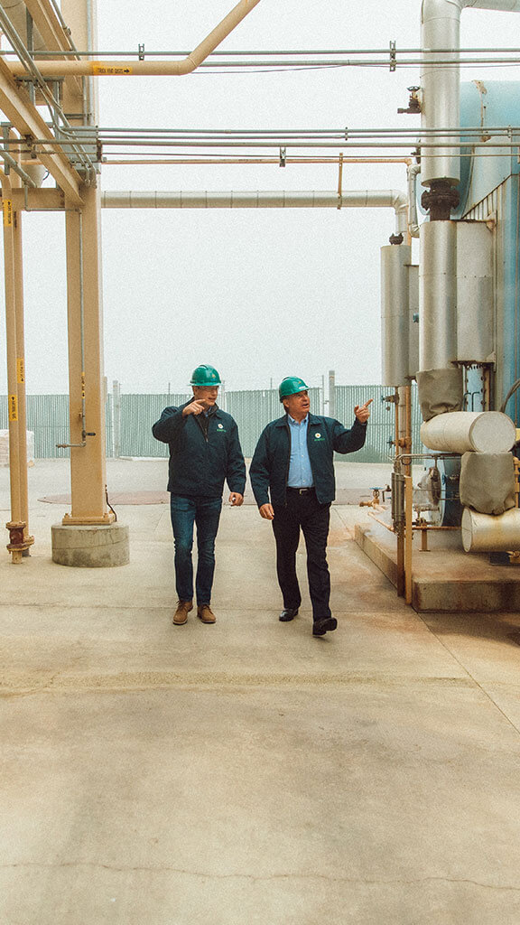 Manufacturing employees walking together